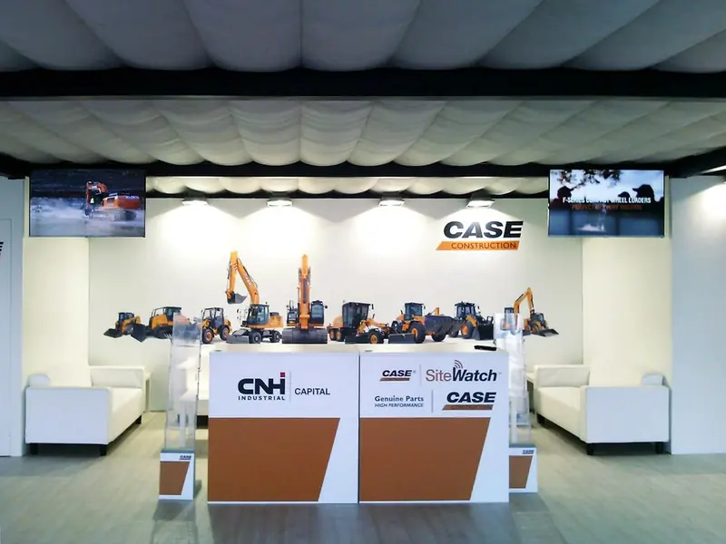 Stand Case con modellini di escavatori e divani